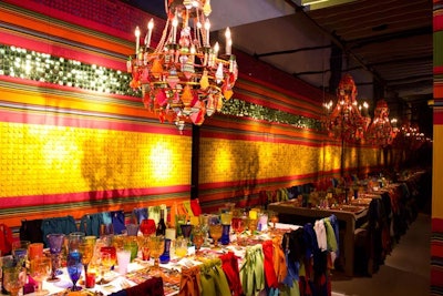New York City-based design team Dransfield & Ross said the zany style inspiration for Sunbrella's tableau came from the 1967 film Casino Royale. Ornate couture chandeliers popped against the fabric company's graphic stripe patterns.