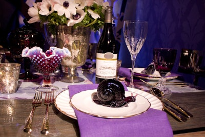 Whimsical touches like glass snails on the table settings were featured in Stacy Garcia's garden-theme space.