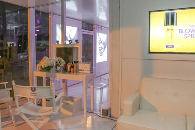 In the lounge's back room, Unilever offered guests reflexology and hair styling services using its products.