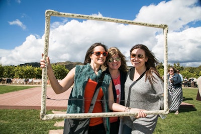 Guests posed for photos in an open frame.