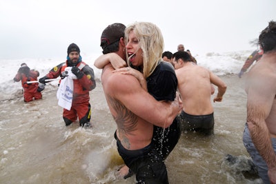 Other actors participating included Chicago Fire actor Taylor Kinney. Kinney's fiancee, Lady Gaga (pictured with Kinney), made a surprise appearance—and took a plunge—at the event.