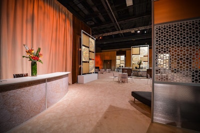Decor elements such as metal screens with a Star of David pattern and a historical mosaic of old Jerusalem broken up into panels kept a lounge for donors on-theme yet sophisticated.