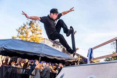 At the Fall Out Boy event, pro skaters did tricks on a ramp.