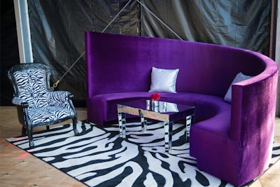 Poison's headline act inspired mirrored surfaces and curvilinear purple velvet seating.