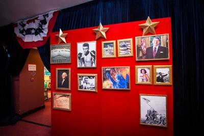 Also at the St. Patrick's School Dinner and Auction, gold stars hung atop a red gallery wall that was decorated with framed photos of American icons.