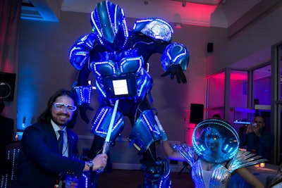 Robotic greeters from Light Up the Night interacted with guests at the event.