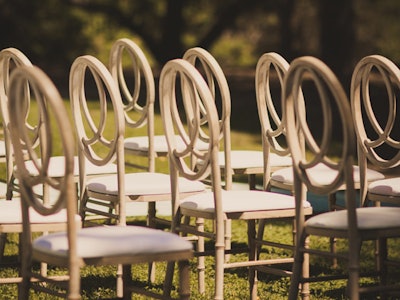 With multiple color options, Blueprint Studios' signature Infinity Chairs provide a unique alternative to the standard chiavari chair.