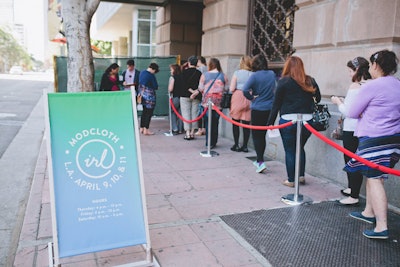 A crowd, pulled from the brand's loyal fans, lined up to enter the space.