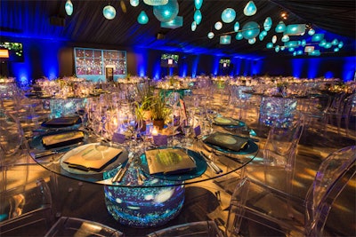 Blueprint Studios enveloped Illuminated Luna Tables with custom prints to suit a firefly-themed dinner and gala at the California Academy of Sciences.