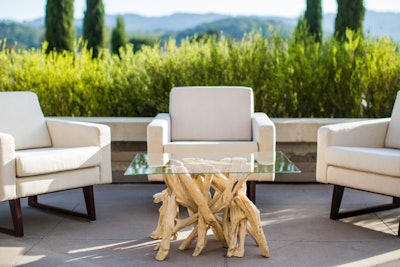 For a California chic look, pair Blueprint Studios' San Simeon Chair with their Driftwood Coffee Table.
