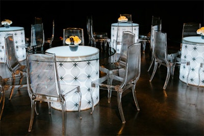 Blueprint Studios enveloped Illuminated Luna Tables with custom prints to suit a black & white themed holiday party.