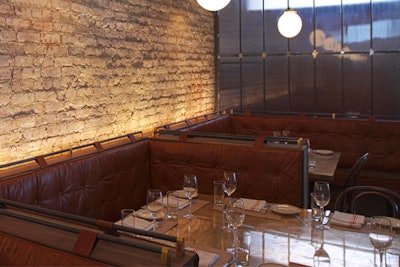 The dining room's vintage leather banquettes.