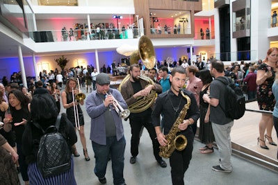 San Francisco-based brass band Brass Mafia walked through the audience to bring attention to the speakers on the stage.