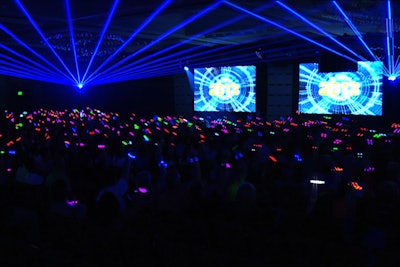 Xylobands and lasers light up a multi-screen video opener by TLC Creative.