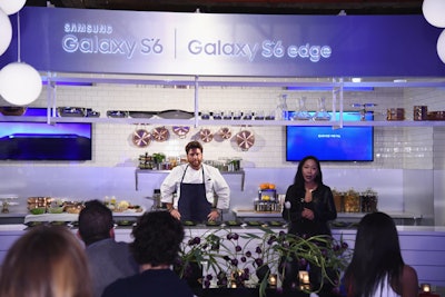 In New York, Samsung created a scenic prop kitchen for celebrity chef Scott Conant, who cooked alongside the V.I.P. dinner table.