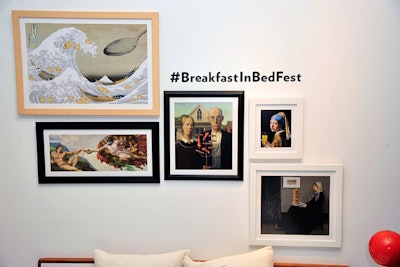 Famous artwork such as 'American Gothic' to a detail of Michelangelo's Sistine Chapel ceiling were reimagined by adding breakfast motifs such as sausages, orange juice, and pancakes. A printed hashtag reminded guests to post to social media.
