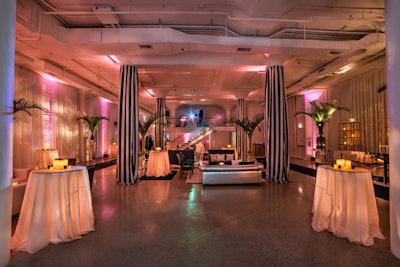 17' ceilings accentuated by yards of black and white fabric.