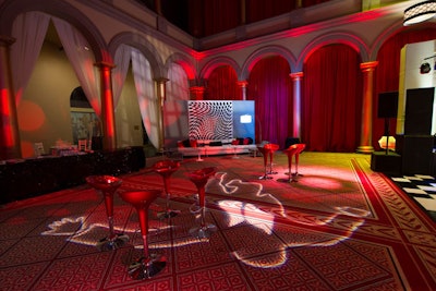 In late January 2013, Jodi Moraru of Evoke designed and planned a Mad Men-inspired corporate event at the National Building Museum in Washington. Futuristic red stools dotted the space, while a lighting projection on the floor displayed the image of a falling man from the show's opening credits.