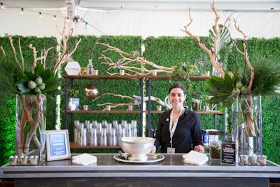 The specialty drink was a fresh-squeezed pomegranate lemonade. Servers used compostable cups to serve the drinks. There were also snacks on offer, including roasted yellow tomato gazpacho, tarragon chicken salad on mini croissants, spring melon salad, and spicy kale chips.