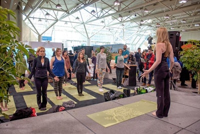 The Sweat Equity Yoga and Fitness stage offered free yoga classes. The stage also hosted workshops and lectures covering health and nutrition.