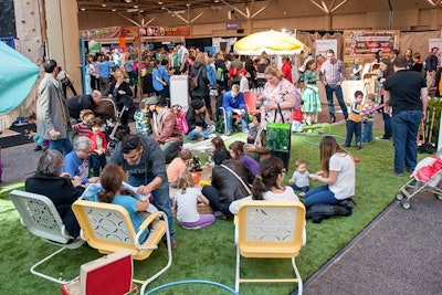 Real estate development, construction, and management company Minto set up an indoor park area with lawn chairs, umbrellas, and a grassy carpet.