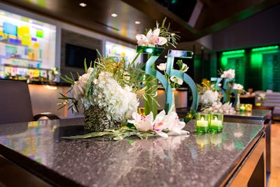 Flowers from Shawna Yamamoto decorated tabletop centerpieces that marked the anniversary.