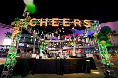 Marquee letters spelled out 'cheers' at the welcome reception.