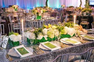 Metallic table linens and Chameleon chairs added sparkle to the opulent look of the Emerald City ball fund-raiser.