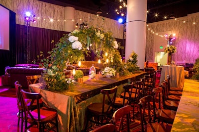 An unusual arching centerpiece decorated a tabletop at the closing gala.