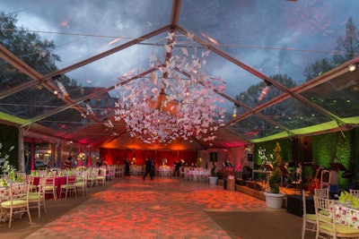 Design Foundry suspended strings of pink butterflies above the dance floor as part of the metamorphosis theme.