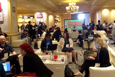 A lounge area at the Oracle Oracle CX Cloud Conference facilitated interaction and networking in a convivial atmosphere, making the most of attendees' face-to-face opportunities at the event.