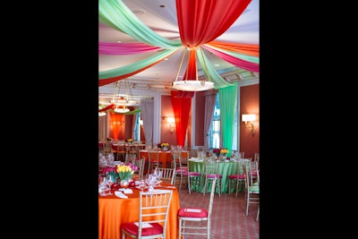 HMR Designs decked the dining room with colorful draping that loosely recalled the shape of a circus tent.