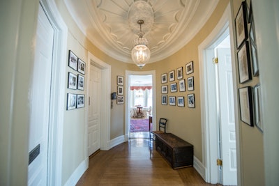 Library entry adjoins upstairs rooms for cocktail hours