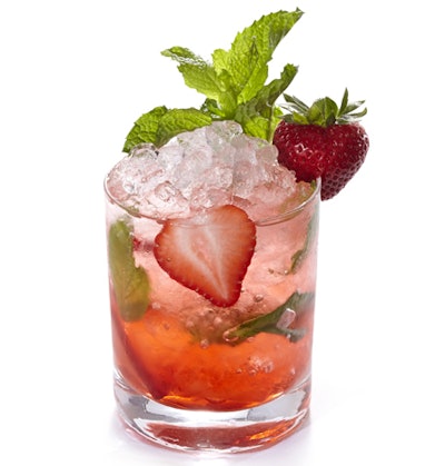 Ken Martin, in-house ­mixologist at Privateer Rum in Ipswich, Massachusetts, makes a strawberry-laced cocktail for the summer. Called the Strawberry Cobbler, the drink contains Privateer Rum, fresh lime juice, and simple syrup, and is served with fresh mint leaves.