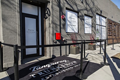 The event took place at new Chicago event space Ovation, and branding started at the exterior with the Tanqueray logo splashed on windows, doors, and a carpet at the entrance.