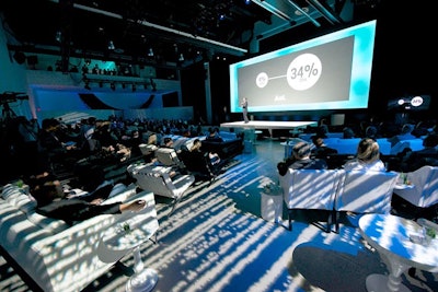 The massive 11,200 square foot presentation space's central focus was a large floating screen