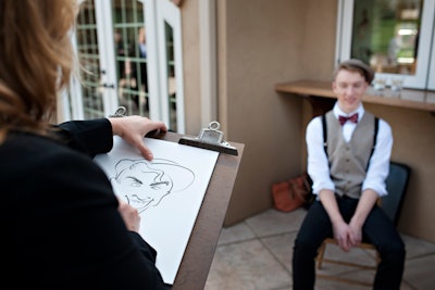 A caricature artist added a traditional element to the punk-meets-Great Gatsby theme of the JDK Group-produced event.