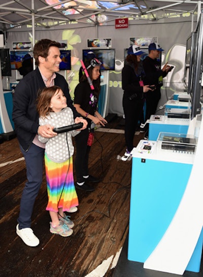 Attendees like James Marsden and his daughter were able to get hands-on time with Splatoon and test out the Turf War multiplayer mode at several kiosks at the event.