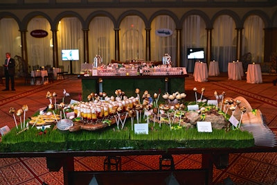 Windows Catering created a “Sweet Trip Through the Park” dessert extravaganza, which included a meadow tablescape set with wheat grass, chocolate rocks and trees stumps, s’more pops, meringue mushrooms, chocolate turtles, and cactus cupcakes.