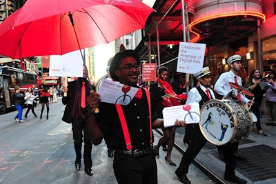 This playful stunt featured a New Orleans-style funeral march honoring the 'death' of print