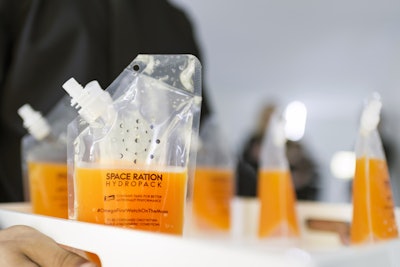 A Fare Extraordinaire provided the dinner, cocktails, and hors d'oeuvres, all of which featured a space-age theme, including the Tang-and-grapefruit-juice-infused vodka cocktail served in a Space Ration Hydropack.