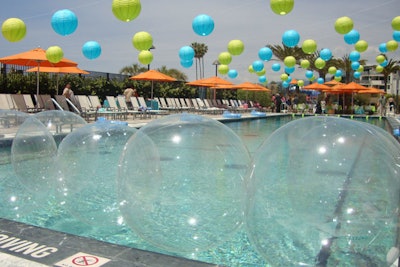 Simple pool decor like inflatables makes an impact without the mess. Colorful, papery decor can bleed when wet and items like small beads could gum up the works on the deck area or in the pool, warns Friedman.