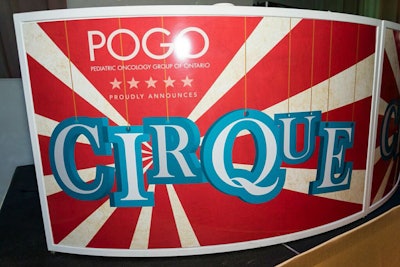 The event's name, 'Cirque,' appeared in signage and in all collateral. Planners purposely avoided using the word 'gala' in any materials.