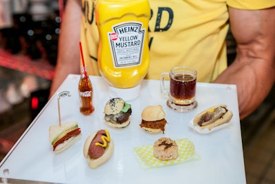 The menu from from Peter Callahan Catering included summertime favorites like sliders, hot dogs, and cheesesteaks, paired with mini bottles of Coca-Cola.