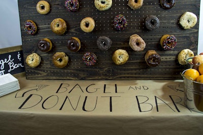 Paramount Events suggests utilizing a tabletop pegboard to present breakfast items like bagels and doughnuts in a fresh, new way for a bridal brunch.