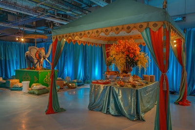 Each garage was decorated as a different F1 location—Monaco, India, Shanghai, and Italy—with custom cabanas and international menu items, like vegetable samosas with tomato chutney, steak frites, and steamed dumplings, from Kurant Events.