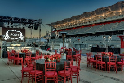 Caplan Miller Events utilized the pit lane of the Circuit of the Americas racetrack and several on-site garages for the bar mitzvah. A logo with a checkered flag and the teen’s name appeared throughout the space.