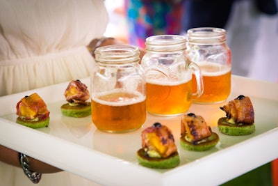 Pancetta-wrapped peaches with a basil pancake were paired with wheat beer in mini mugs at a Tastings-catered event held at a private residence on Staten Island in New York.