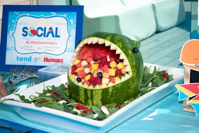 For a Huggies “Little Swimmers” launch event at the Annenberg Community Beach House, Schaffer’s Genuine Foods created a watermelon 'shark' filled with fruit salad, featuring blueberries for eyes and kale “seaweed” with swedish fish and chocolate shells.
