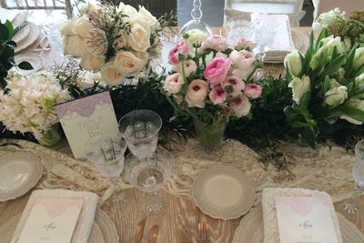 Lace is also showing up in wedding decor. At a Los Angeles luncheon hosted by Beverly Hills event planner Mindy Weiss and Wedding Paper Divas, a room with heavy draping by Revelry showcased a lace-topped table.